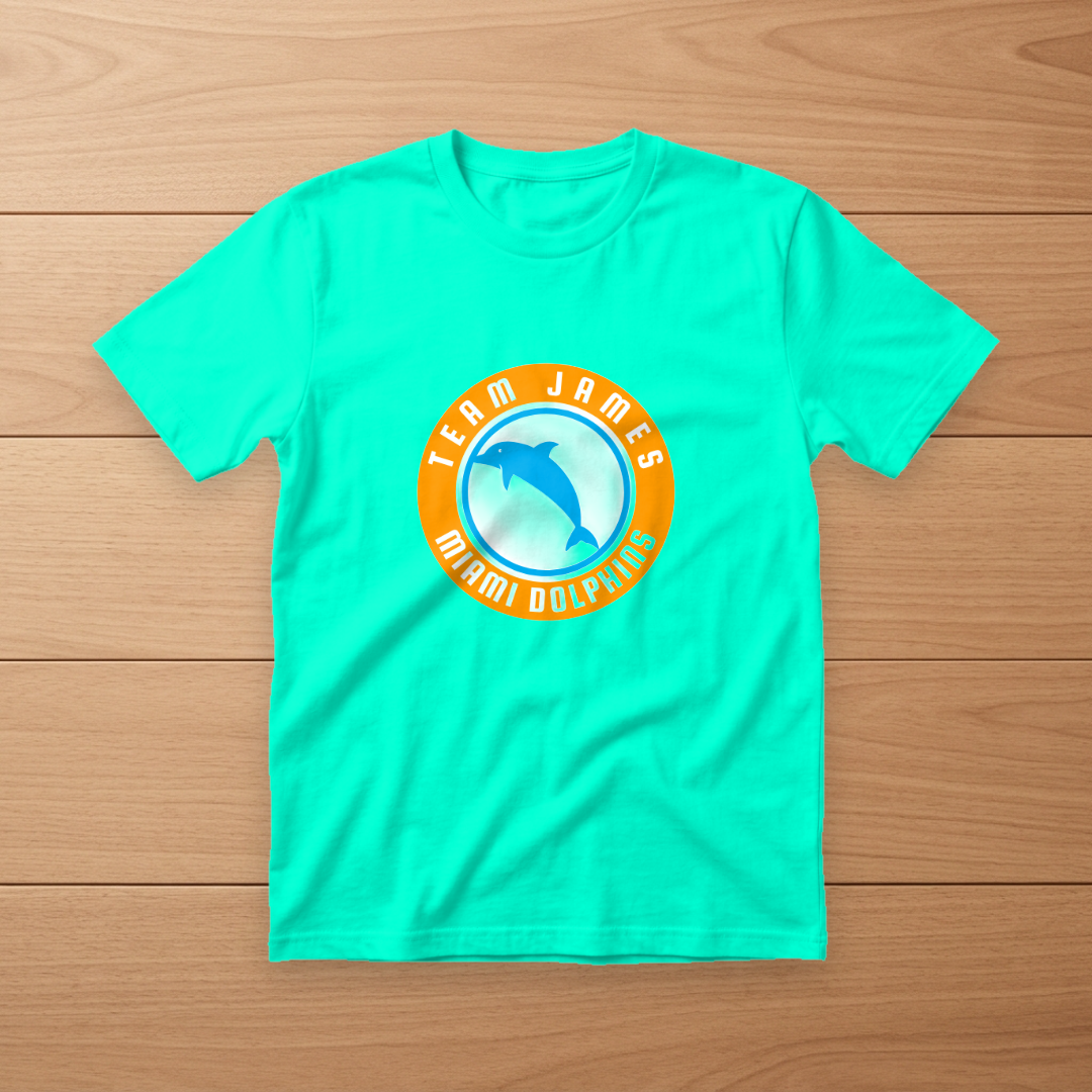Teal t-shirt with a circular Team James crest logo